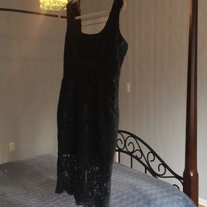Elegant black lace cocktail dress.